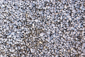 Gravel texture. Pebble stone background. Granite gravel texture. Gray gravel floor texture. High quality photo