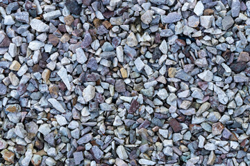 Gravel texture. Pebble stone background. Granite gravel texture. Gray gravel floor texture. High quality photo