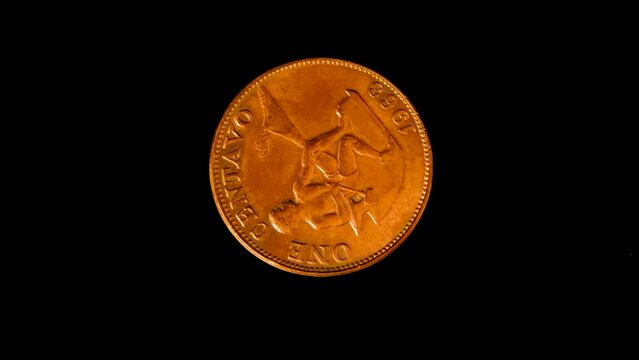 Reverse of old Philippines coin 1 centavo 1963, isolated in black background. 4k video.