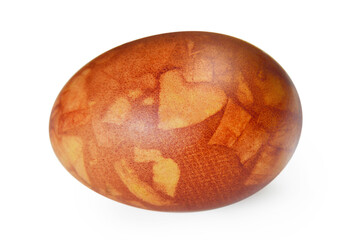 Easter egg dyed with onion skins isolated on white background. Natural Easter concept. Easter egg decorated with heart shape, marble effect.