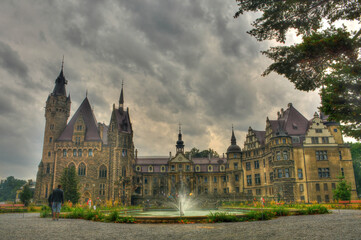 Dramatic, panoramic view on the Moszna castle in Lowe Silesia, Poland