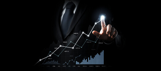 Businessman analyst working with digital finance business data graph showing technology of...