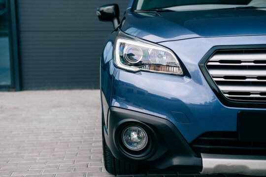 Modern subcompact crossover SUV  beautiful wheels, large chrome grille.