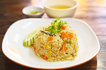 mackerel Fried Rice  fish.Quick and Easy Thai style spicy one dish meal and soup on white plate