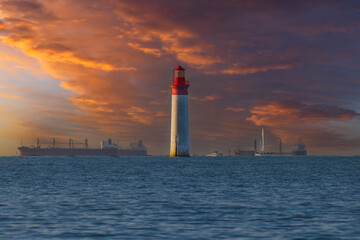 Fototapeta premium Phare de Chauvea near Ile de Re with ships to La Rochelle, Pays de la Loire, France