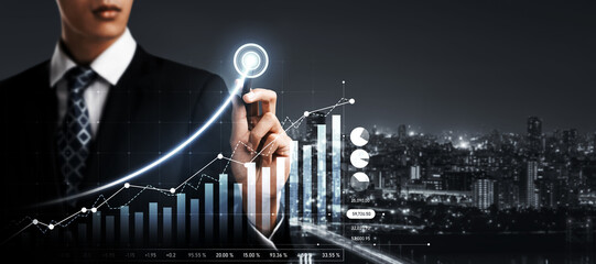 Businessman analyst working with digital finance business data graph showing technology of...