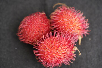 The rambutan taxonomic name: Nephelium lappaceum) is a medium-sized tropical tree in the family Sapindaceae. Amazonas - Brazil.