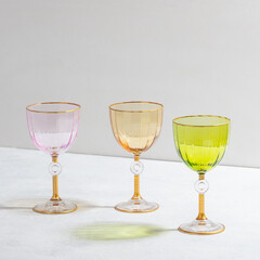 Concept with colored glass goblets