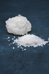Rock salt on black background