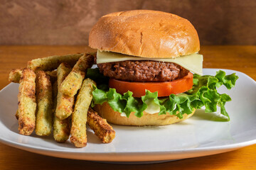 plant based burger with a side of broccoli fries