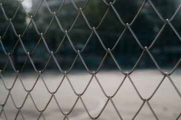 Fototapeta premium Close-up chain link fence , Sunset