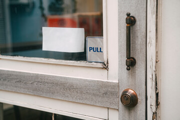  sign hanging outside a restaurant, store, office or other