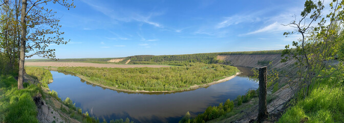 Panorama of summer river landscape with clear sky view from mountain