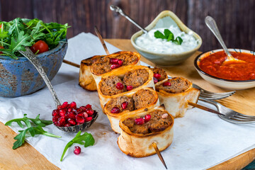 Beyti - Turikish lamb kofte-style kebab wrapped in flatbread