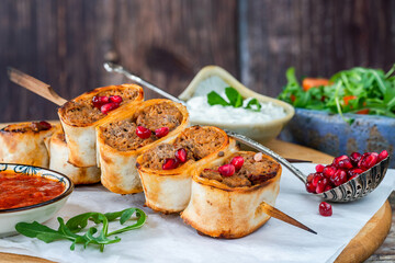 Beyti - Turikish lamb kofte-style kebab wrapped in flatbread