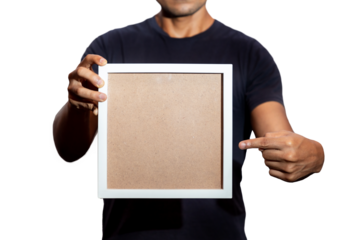 HOMBRE CON UN MARCO VACIO PARA TEXTO EN SUS MANOS, EN PNG SIN FONDO.
