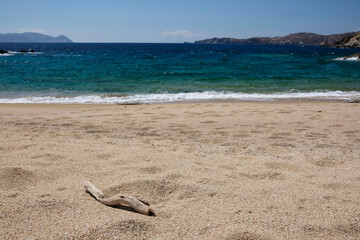 The beautiful turquoise sandy beach of Sapounohoma in Ios Greece