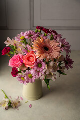 Beautiful fresh flowers. Pink bouquet of flowers in vase.
