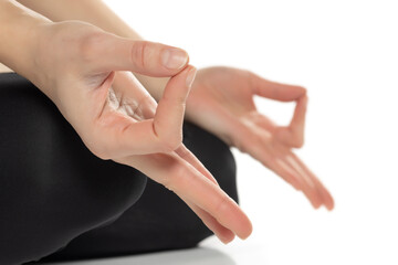 Fototapeta na wymiar Close up hands. Woman do yoga relax on white background. Healthy and Yoga Concept