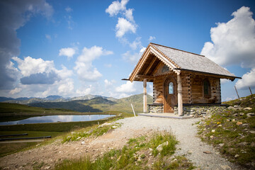 wooden house in the mountains with beautiful natural landscape in the background