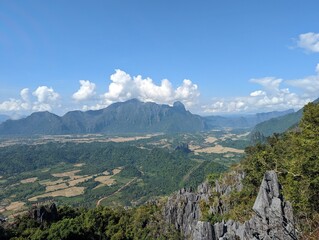 Fototapeta na wymiar Mountain at Vang Vieng Laos. Nature Sky Cloud Sun. Amazing tourist top spot, Hike through forest and mountain