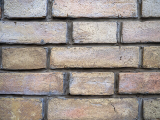 Wall of the old church. Background from brown bricks. Stone pattern. Construction.