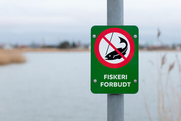 Danish fishing prohibited sign near lake - NO FISHING