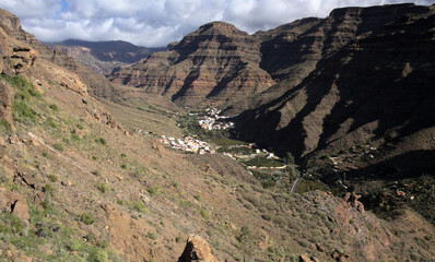 Gran Canaria, landscape of the southern part of the island along Barranco de Arguineguín steep and deep ravine
with vertical rock walls, circular hiking route visiting several viewpoints