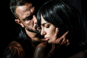 Romantic sexy couple kiss. Sensual couple in love kiss. Passion, dating and love. Young beautiful sexy lovers kiss. Sensual relationship. Studio portrait of young couple. Beautiful sensual woman and