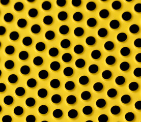black holes on yellow metal background
