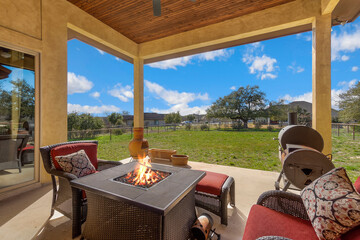 A back patio with a firepit