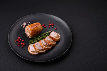 Delicious chicken or pork meat roll with mushrooms, cheese, spices and herbs