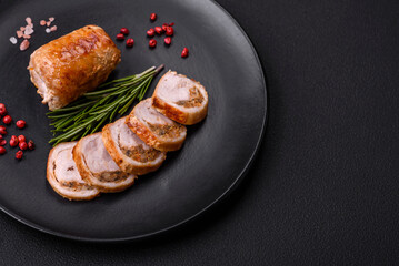 Delicious chicken or pork meat roll with mushrooms, cheese, spices and herbs
