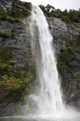 Fototapeta na wymiar waterfalls on the rocky cliffs