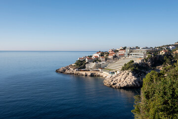 Fototapeta na wymiar Famous Libertas hotel on the rocky shore of Dubrovnik, one of the most known croatian architecture landmarks