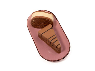 Piece of chocolate cake isolated on white background. A slice of chocolate cake.