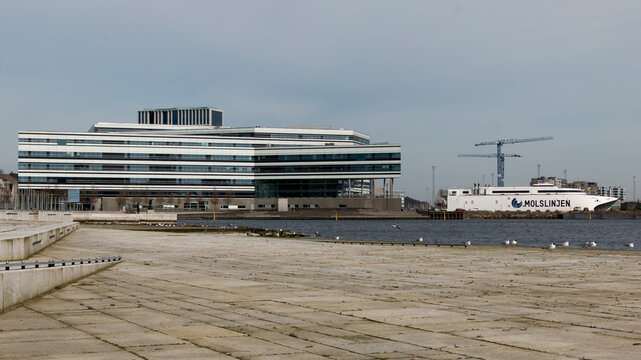 Navitas building, Aarhus, Denmark - 24 march 2020: on the left in the picture and Molsliniens Express ferry on the right in the picture