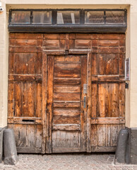 Aarhus, Denmark - 24 march 2020: An old door, big nice wooden door. small windows at the top