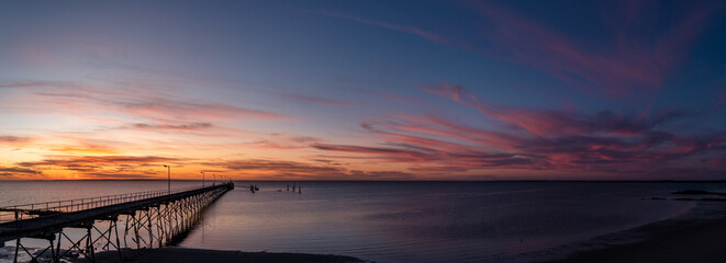 panoramic sunset with pier