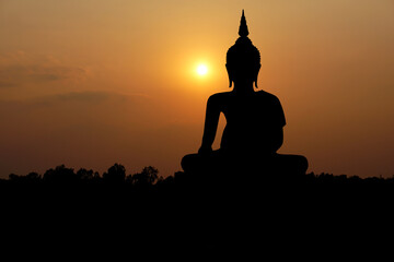 big buddha silhouette sunset background.Makha Bucha Day.Vesak Day.Asanha Bucha.Buddhist Lent.