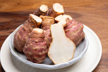 Group of fresh uncooked topinambur or Jerusalem artichoke roots