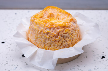 French Langres soft cows crumbly cheese with washed rind structure made in Champagne - Ardenne region