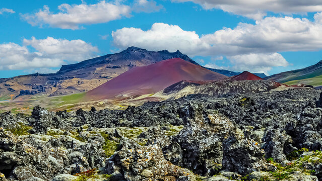 Beautiful volcanic rough rugged landscape, lava ash stone field, red volcano crater -  Helgafellssveit, Helgafell, Iceland