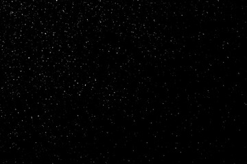 Naklejka na ściany i meble Abstract black background with sparkles and shadows. Fluidity, waves, glitter, fluid, glitter, shimmer. Stars, stardust, space, outer space, comets, placer.