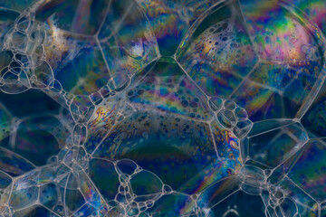 A soap bubble is an extremely thin film of soap or detergent and water enclosing air that forms a hollow sphere with an iridescent surface. Soap bubbles usually last for only a few seconds