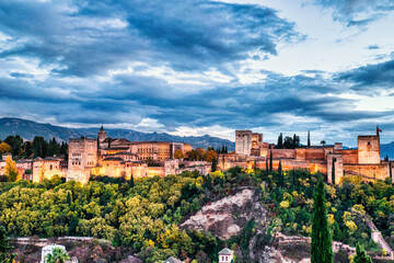 Fototapeta na wymiar Illuminated Alhambra Fortress Aerial View at Dusk, Granada, Andalusia