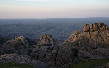 Unique view of the rock massif Los Gigantes in Cordoba, Argentina. View of the hills and rock textures with a beautiful sunset light.