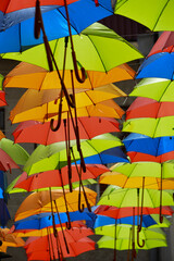 Fototapeta na wymiar street lined with umbrellas