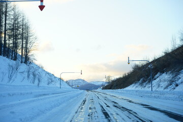 Icy Road or Icy Surface Road on Taisetsuzan Mountain or Daisetsuzan National Park in  Hokkaido,...