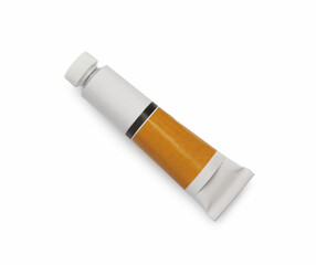 Tube with oil paint on white background, top view